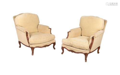 A PAIR OF STAINED WOOD AND UPHOLSTERED YELLOW ARMCHAIRS IN L...