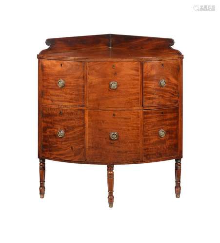 A GEORGE III MAHOGANY BOWFRONT CORNER CABINET