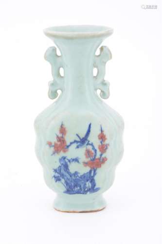 A CHINESE CELADON GROUND TWIN HANDLED VASE