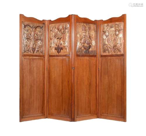 A MAHOGANY AND EMBOSSED LEATHER FOLDING ROOM SCREEN