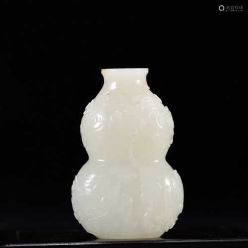 A Chinese Carved Jade Double Gourd Vase