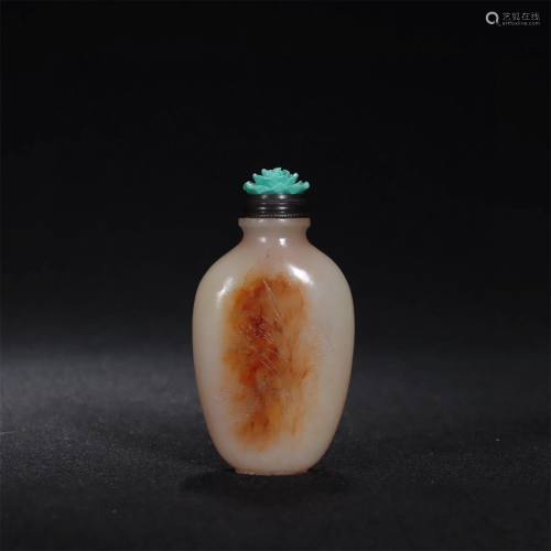 A Chinese Carved Jade Snuff Bottle