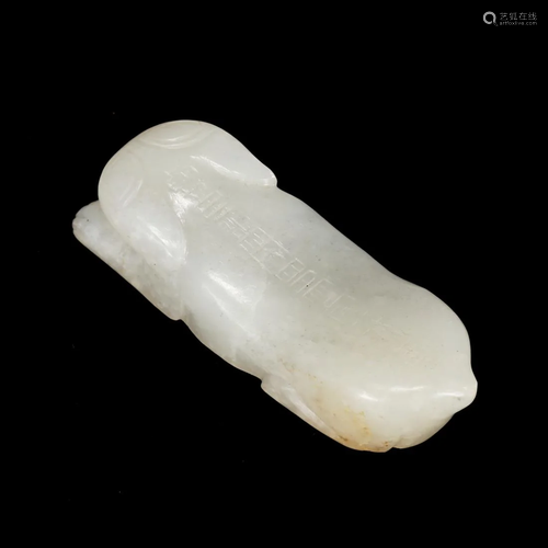 A WHITE JADE 'BEAST' PAPERWEIGHT