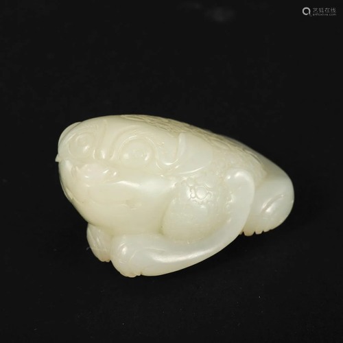 A WHITE JADE 'BEAST' CARVING