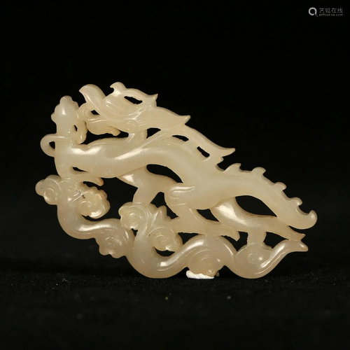 A CARVED WHITE JADE 'DRAGON' PENDANT