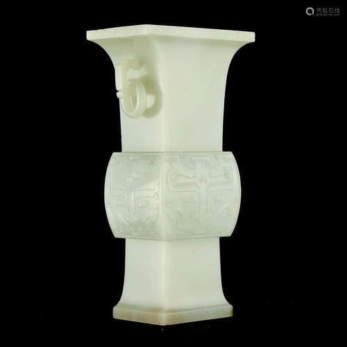 A WHITE JADE SQUARED BEAKER VASE WITH HANDLES