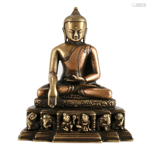 A BRONZE SEATED BUDDHA