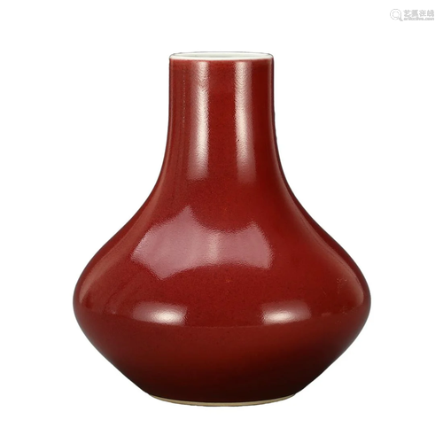 A RED-GLAZED VASE