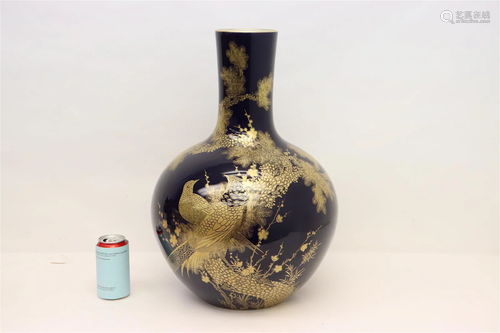 A large Chinese gold on blue bottle vase