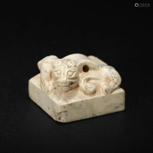 A WHITE JADE 'CHILONG' SEAL