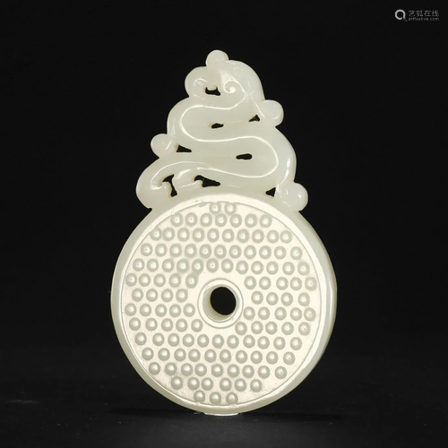 A WHITE JADE ARCHAISTIC CARVING