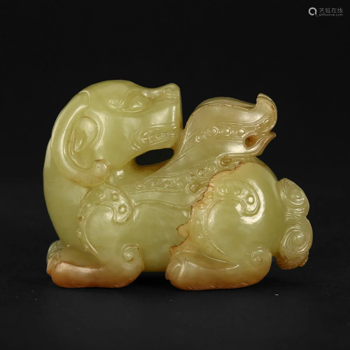 A YELLOW JADE 'BEAST' CARVING