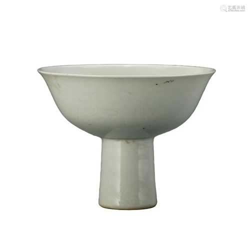 A WHITE-GLAZED CARVED 'DRAGON' STEM BOWL