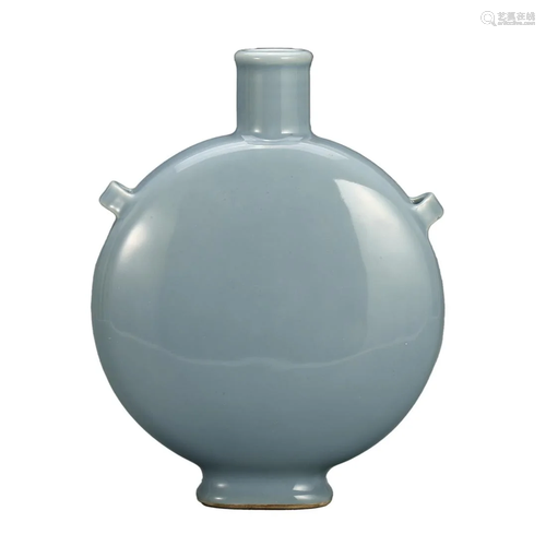 A SKY BLUE-GLAZED VASE WITH HANDLES