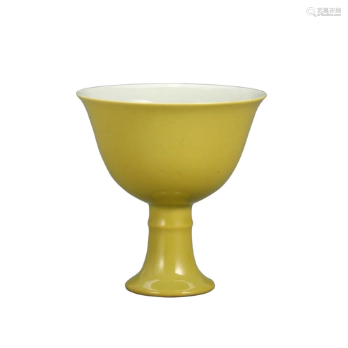 A YELLOW-GLAZED CUP