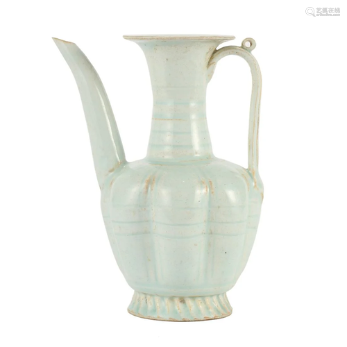 A WHITE-GLAZED EWER