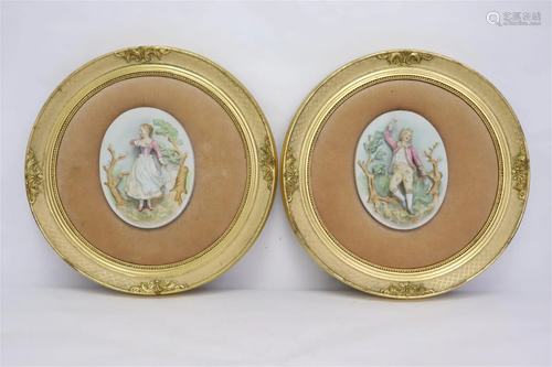 2 wall hanging plaques with bisque figures