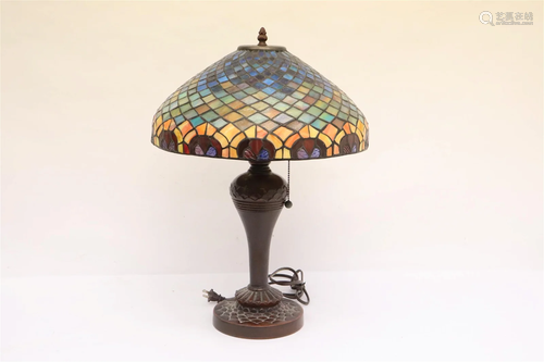 A beautiful bronze based leaded glass shade lamp