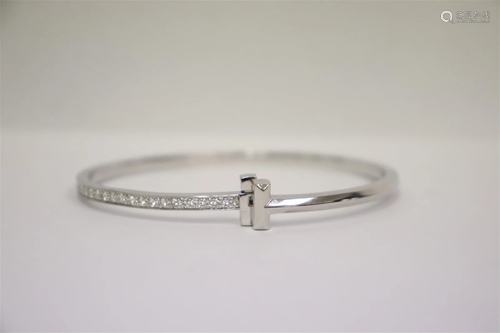 18K diamond bangle bracelet by Tiffany and co.