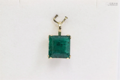 A 14K Y/G emerald pendant