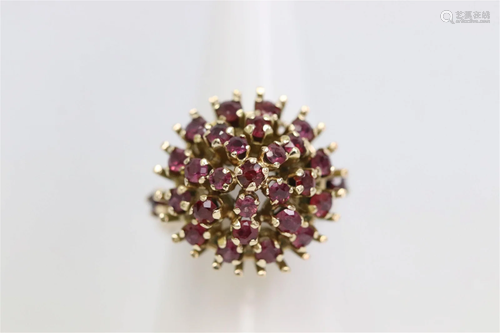 14K rose gold ring set with small rubies