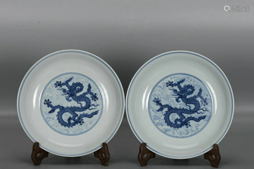 TWO CHINESE BLUE-AND-WHITE CHARGERS DEPICTING 'DRAGON A...