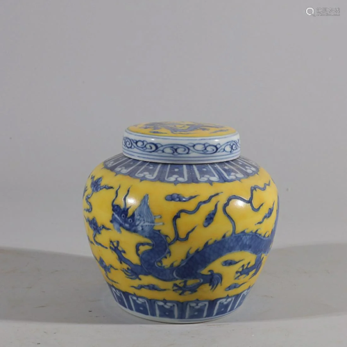 CHINESE YELLOW-GROUND BLUE-AND-WHITE COVERED JAR DEPICTING &...