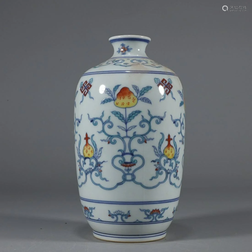 CHINESE DOUCAI VASE DEPICTING 'FLORAL', 'QING...