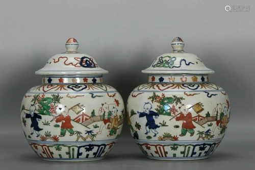 TWO CHINESE FAMILLE-VERTE COVERED JARS DEPICTING 'CHILD...