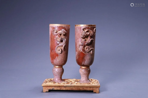 TWO CHINESE GILDED ON ANTIQUE JADE CUPS WITH CARVED 'DR...