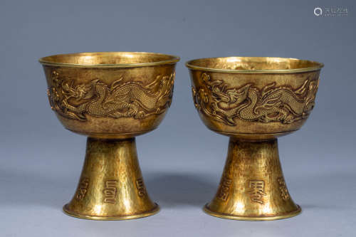 A pair of ancient Chinese golden dragon and phoenix high-foo...