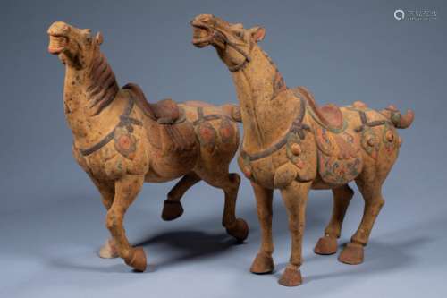 A pair of ancient Chinese painted bronze horses