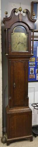 A George III oak cased longcase clock, the arched top brass ...