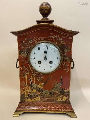An early 20th century Japanned red and gilded mantle clock, ...