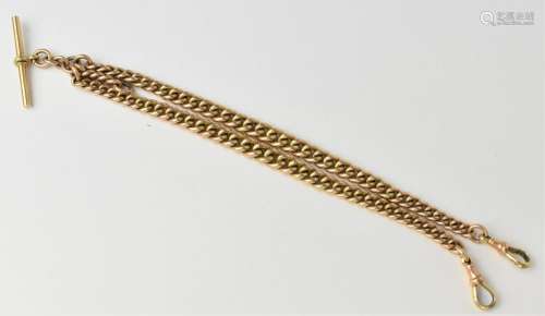 A 9ct gold chain link pocket watch chain having two dog clip...