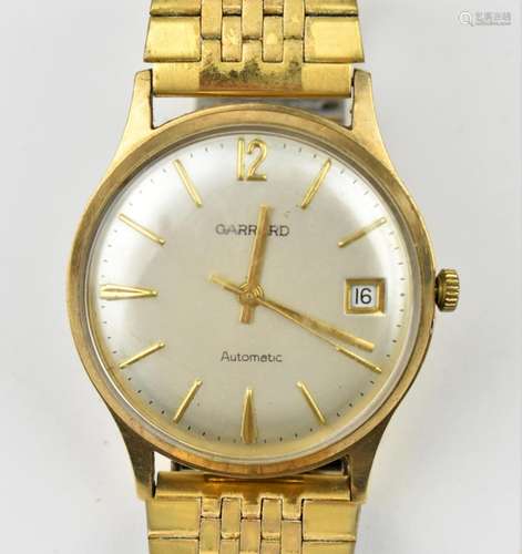 A Garrard automatic, gents 9ct gold, wristwatch, circa 1970s...