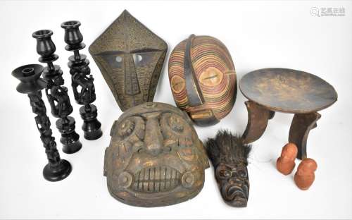 A small collection of tribal carvings, to include three figu...