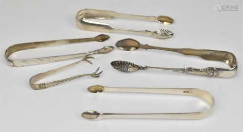Five British silver sugar tongs, earliest hallmarked for 179...