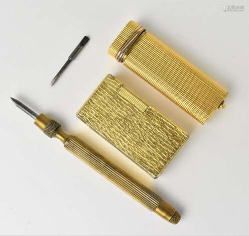 A French Cartier trinity rings gold plated lighter, with eng...