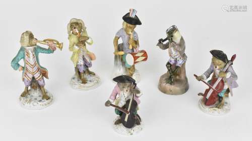A late 19th century German porcelain part monkey band, to in...