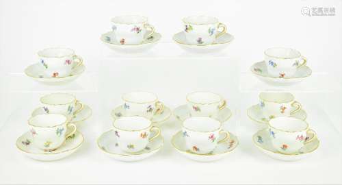 A set of twelve 20th century Meissen mocha cups and saucers,...