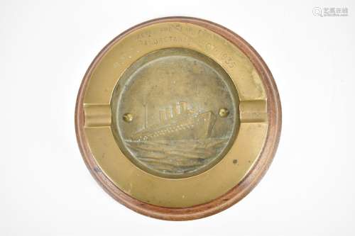 An early 20th century ashtray, made from brass and teak take...