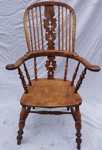 A 19th century ash and elm windsor armchair, with high hoop ...