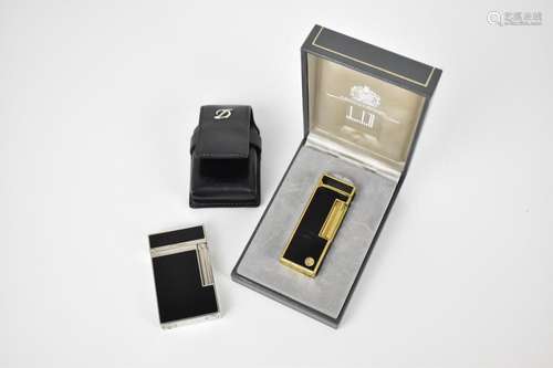 An Art Deco style black and chrome Dupont lighter with origi...