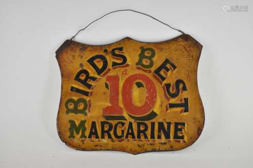 A vintage `Bird`s Best Margarine` advertising sign, in a car...