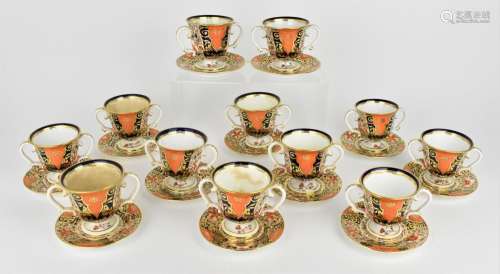 A set of twelve early 19th century Royal Crown Derby cups an...