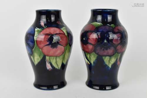 A pair of Walter Moorcroft ceramic baluster vases in the `Pa...