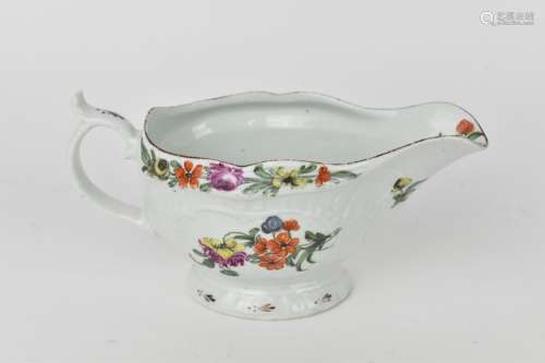 A late 18th century Worcester porcelain sauceboat, with hand...