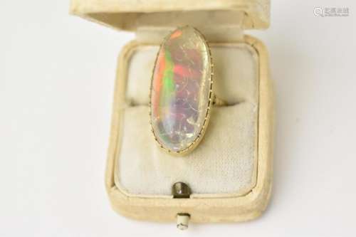 A yellow metal mounted impressive water opal cocktail ring, ...