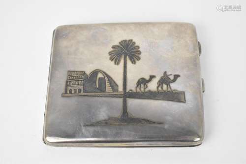 A Continental white metal cigarette case, with niello enamel...